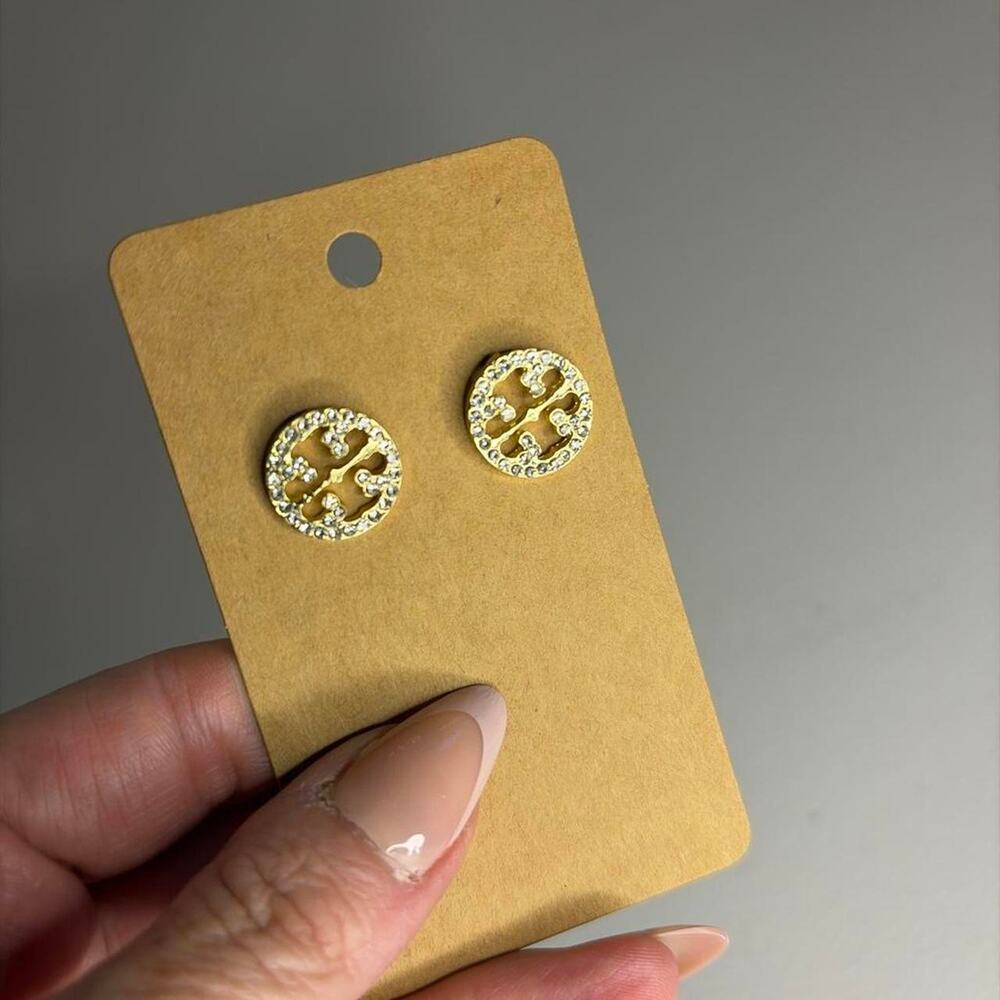 Cross logo gold and white
